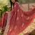 peach embroidered saree with paisley motifs