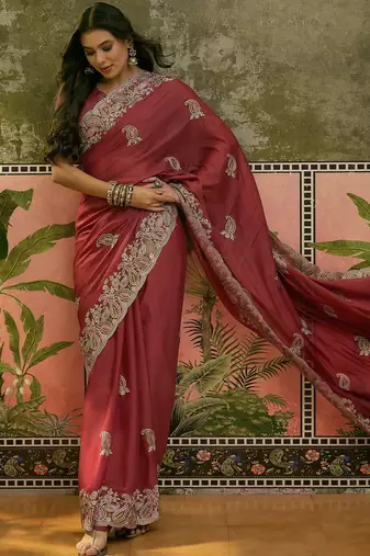 peach embroidered saree with paisley motifs