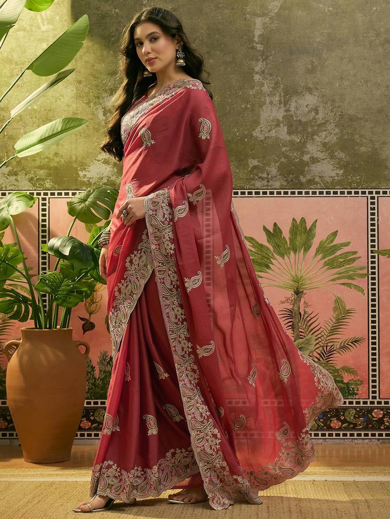 peach embroidered saree with paisley motifs