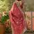 peach embroidered saree with paisley motifs