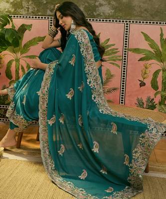 teal blue embroidered saree with paisley motifs 2