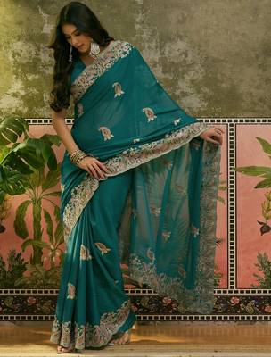 teal blue embroidered saree with paisley motifs 3