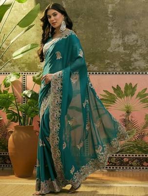 teal blue embroidered saree with paisley motifs 4