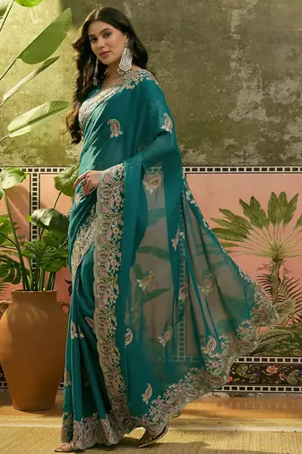 teal blue embroidered saree with paisley motifs