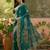 teal blue embroidered saree with paisley motifs