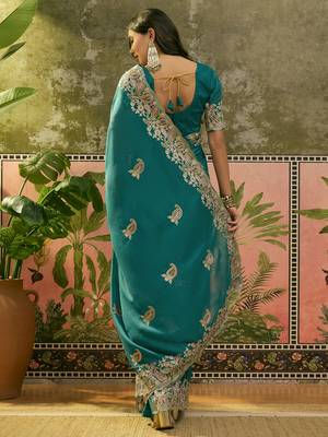 teal blue embroidered saree with paisley motifs 5