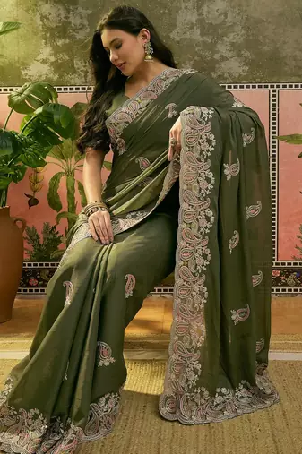 olive green embroidered saree with paisley motifs