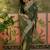 olive green embroidered saree with paisley motifs