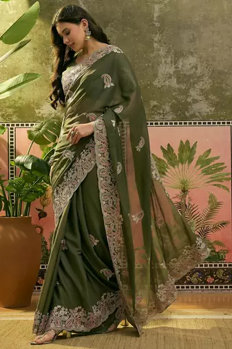 olive green embroidered saree with paisley motifs
