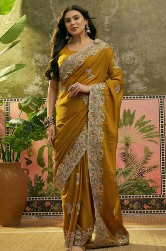 mustard embroidered saree with paisley motifs