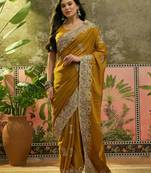 mustard embroidered saree with paisley motifs