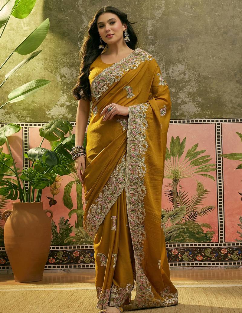 mustard embroidered saree with paisley motifs