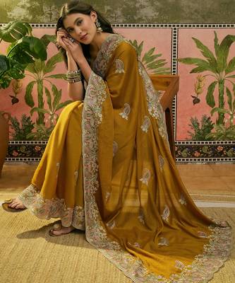 mustard embroidered saree with paisley motifs 2
