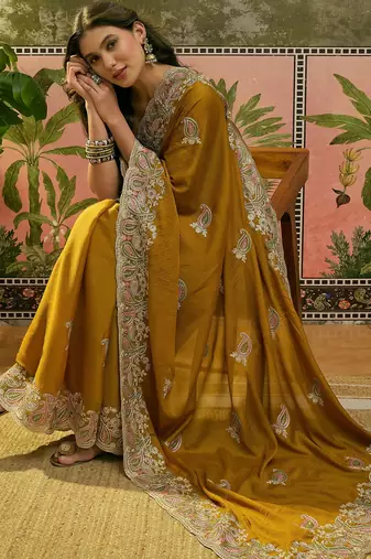 mustard embroidered saree with paisley motifs