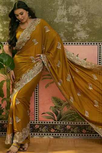 mustard embroidered saree with paisley motifs