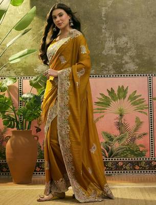 mustard embroidered saree with paisley motifs 4