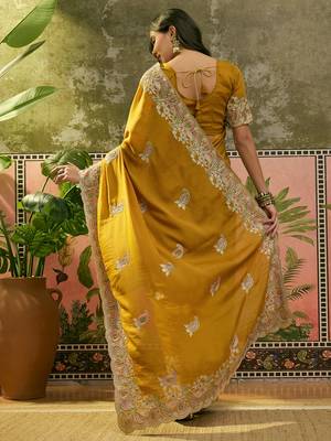 mustard embroidered saree with paisley motifs 5