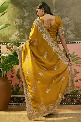 mustard embroidered saree with paisley motifs