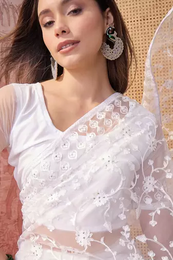 White blue embroidered sheer saree with floral motifs