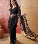Black blue embroidered sheer saree with floral motifs