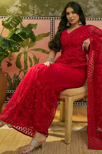 Red embroidered sheer saree with floral motifs