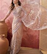 Cement beige embroidered sheer saree with floral motifs
