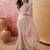 Cement beige embroidered sheer saree with floral motifs