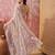 Cement beige embroidered sheer saree with floral motifs