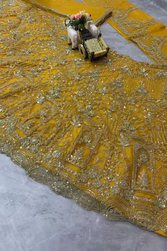 yellow color Coding Sequins Work Net Lehenga Choli set