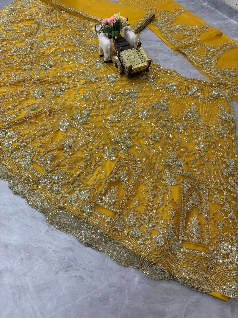 yellow color Coding Sequins Work Net Lehenga Choli set