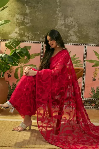 Red embroidered sheer saree with floral motifs