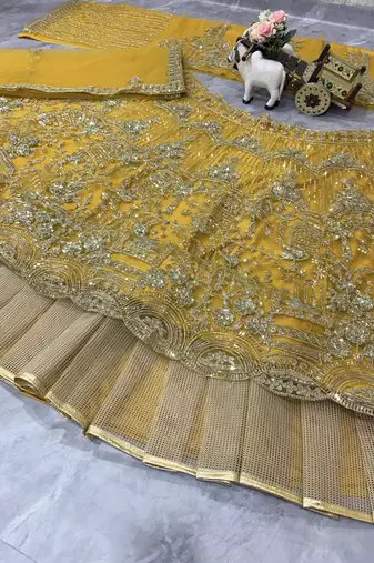 yellow color Coding Sequins Work Net Lehenga Choli set
