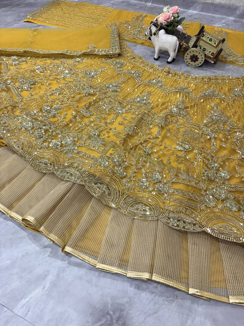 yellow color Coding Sequins Work Net Lehenga Choli set