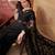 Black embroidered sheer saree with floral motifs