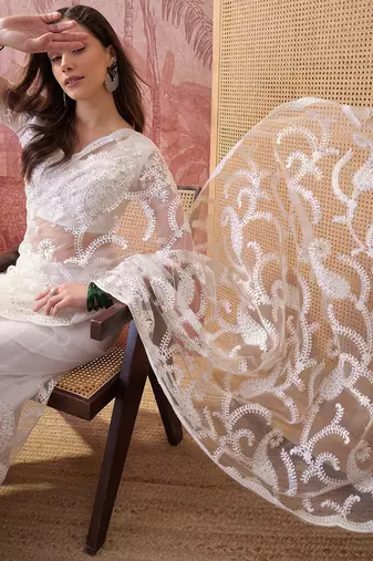 White embroidered sheer saree with floral motifs