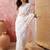 White embroidered sheer saree with floral motifs