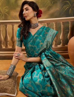 teal banarasi jacquard saree with rich zari weaving, mina & lace work on pallu 2