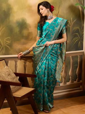 teal banarasi jacquard saree with rich zari weaving, mina & lace work on pallu 3
