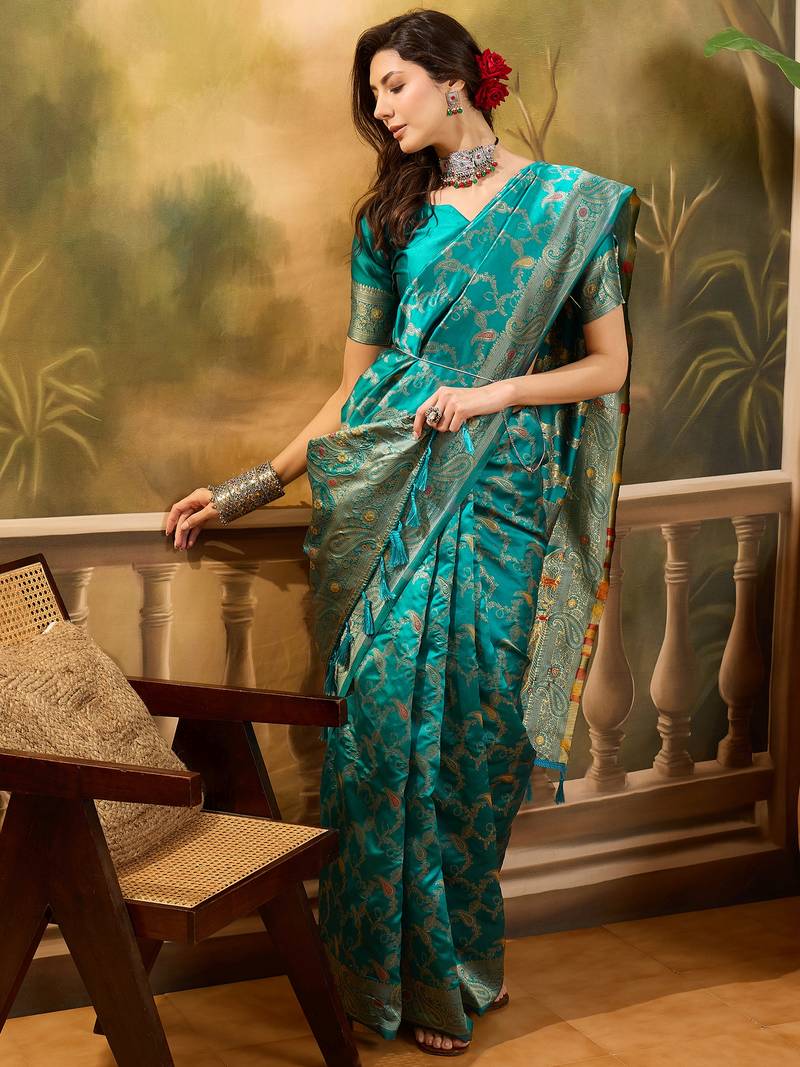 teal banarasi jacquard saree with rich zari weaving, mina & lace work on pallu