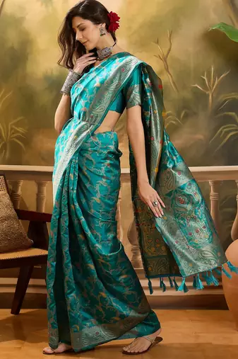teal banarasi jacquard saree with rich zari weaving, mina & lace work on pallu