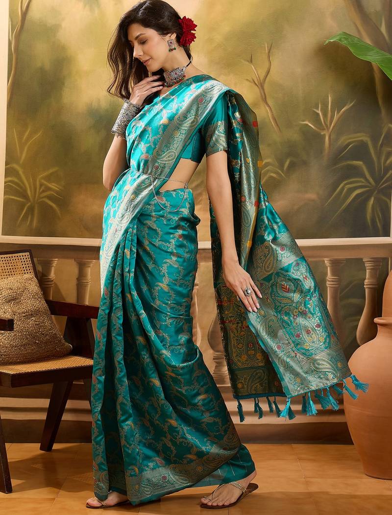 teal banarasi jacquard saree with rich zari weaving, mina & lace work on pallu