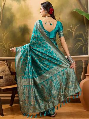 teal banarasi jacquard saree with rich zari weaving, mina & lace work on pallu 5