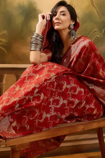 red banarasi jacquard saree with intricate zari weaving, mina & lace work on pallu