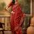 red banarasi jacquard saree with intricate zari weaving, mina & lace work on pallu