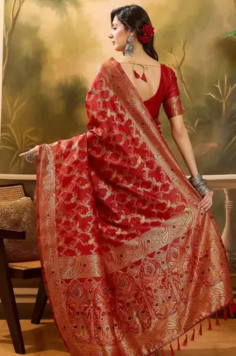 red banarasi jacquard saree with intricate zari weaving, mina & lace work on pallu