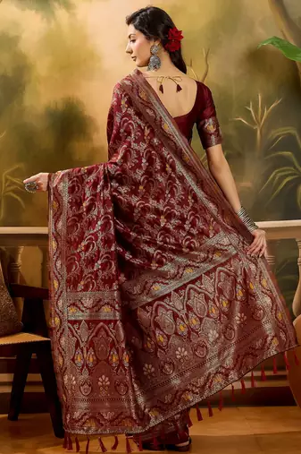 maroon banarasi jacquard saree with rich zari weaving, mina & lace work on pallu