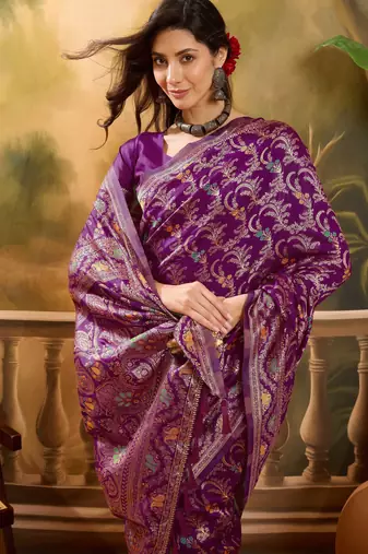 purple banarasi jacquard saree with rich zari weaving & tassel pallu     unstitched blouse included