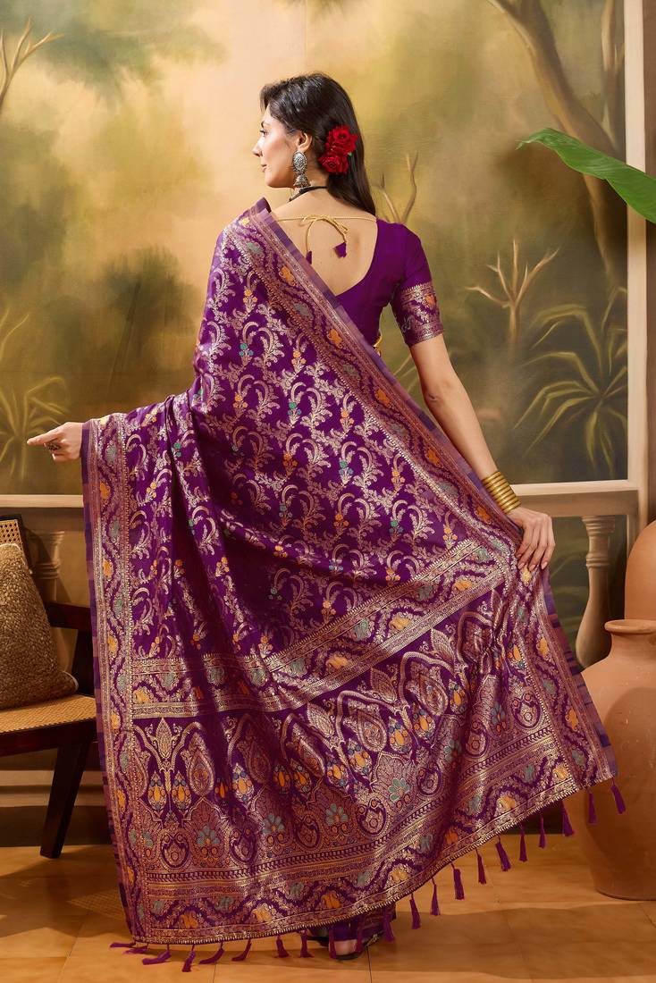 purple banarasi jacquard saree with rich zari weaving & tassel pallu     unstitched blouse included