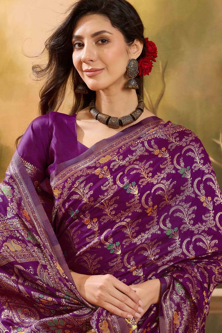 purple banarasi jacquard saree with rich zari weaving & tassel pallu     unstitched blouse included