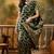 black banarasi jacquard saree with rich zari weaving & tassel pallu     includes unstitched blouse